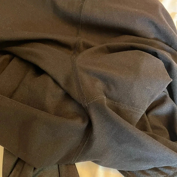 Lululemon black joggers with drawstring elastic waist band, and hemline.  Size 4 - Picture 9 of 13